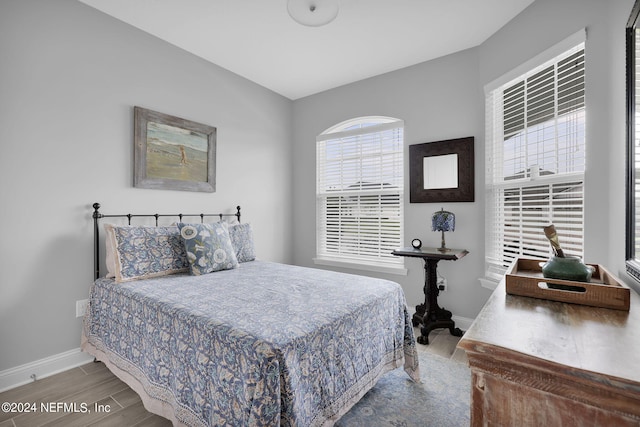 bedroom featuring hardwood / wood-style floors