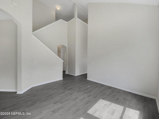 interior space featuring wood-type flooring and lofted ceiling