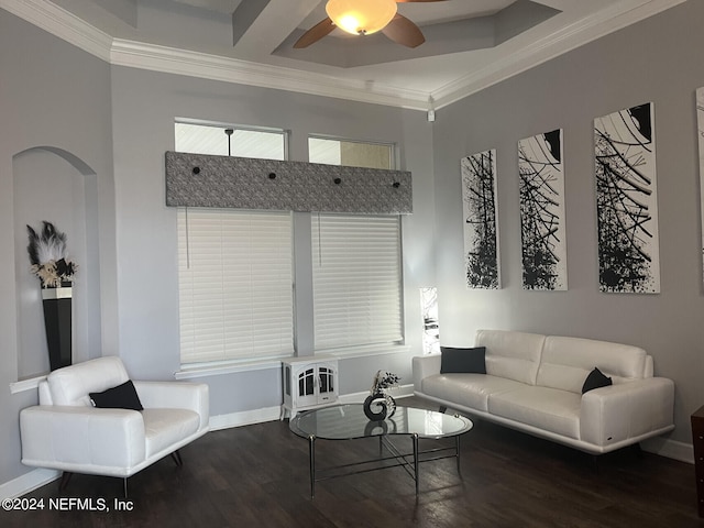 living room featuring ornamental molding, wood-type flooring, and ceiling fan