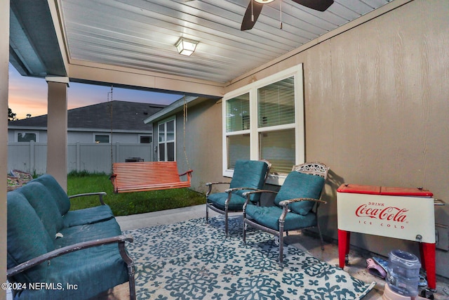 patio terrace at dusk with ceiling fan