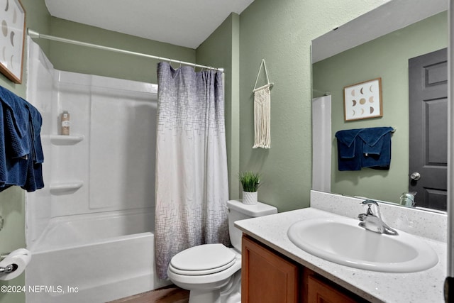 full bathroom featuring shower / bath combo with shower curtain, toilet, and vanity