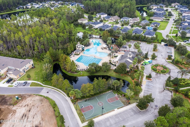 aerial view featuring a water view and a residential view