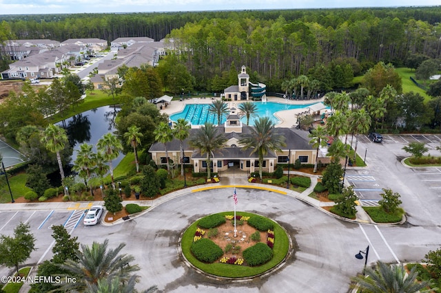 bird's eye view featuring a forest view