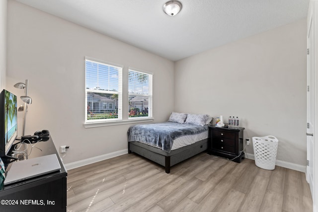 bedroom featuring light hardwood / wood-style floors