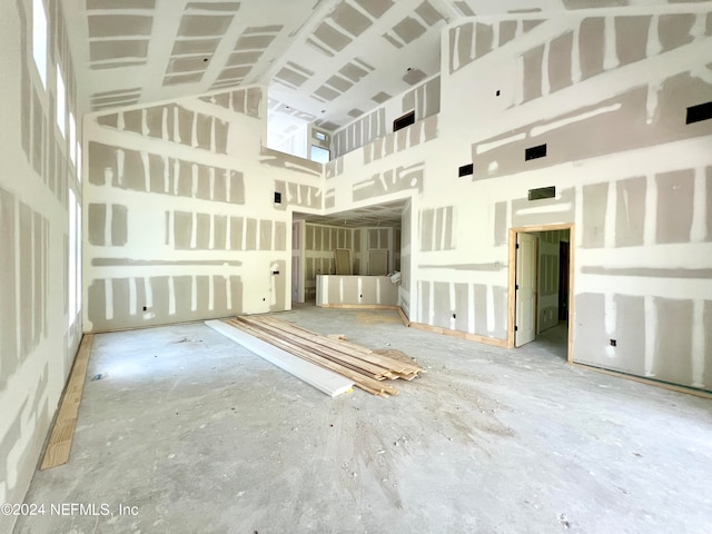 interior space with a towering ceiling