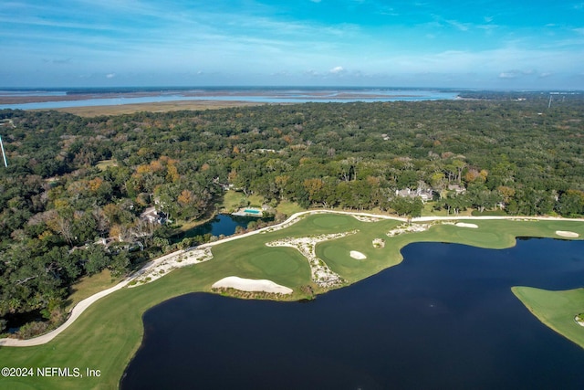 aerial view featuring golf course view, a water view, and a view of trees