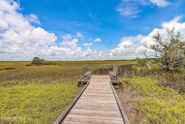 view of dock featuring a rural view