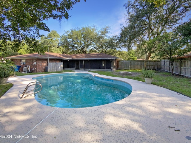 view of pool with a patio, a fenced backyard, and a fenced in pool