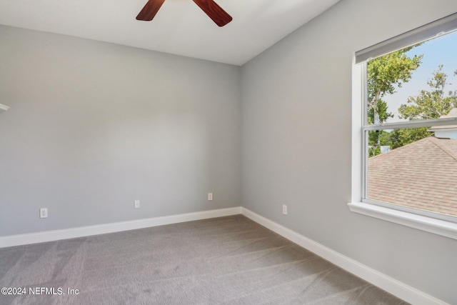 unfurnished room featuring carpet flooring and ceiling fan