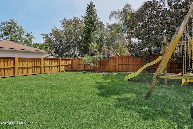 view of yard featuring a playground