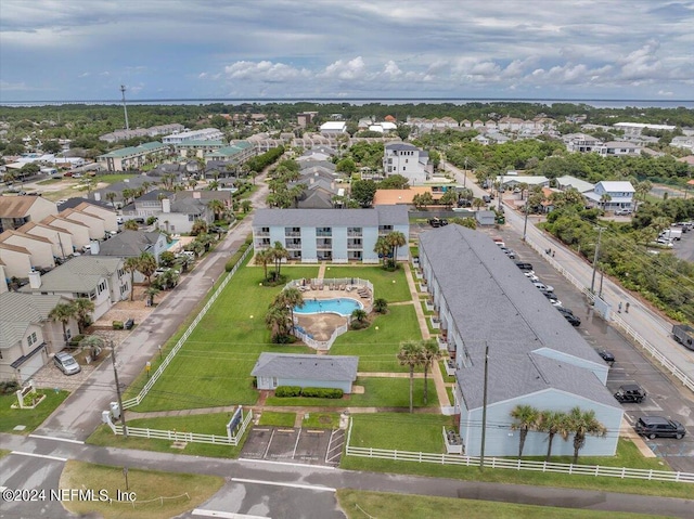 birds eye view of property with a residential view