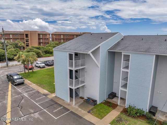 exterior space with uncovered parking