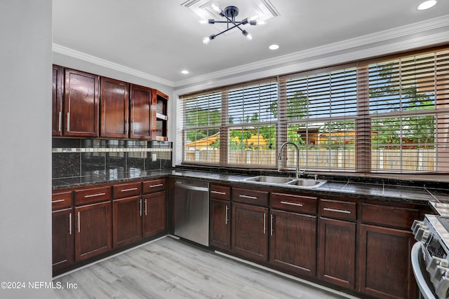 kitchen featuring sink, crown molding, tasteful backsplash, appliances with stainless steel finishes, and light hardwood / wood-style floors