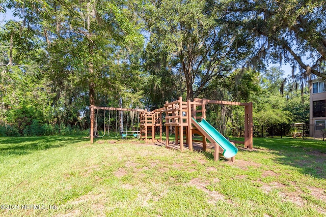 view of playground featuring a lawn