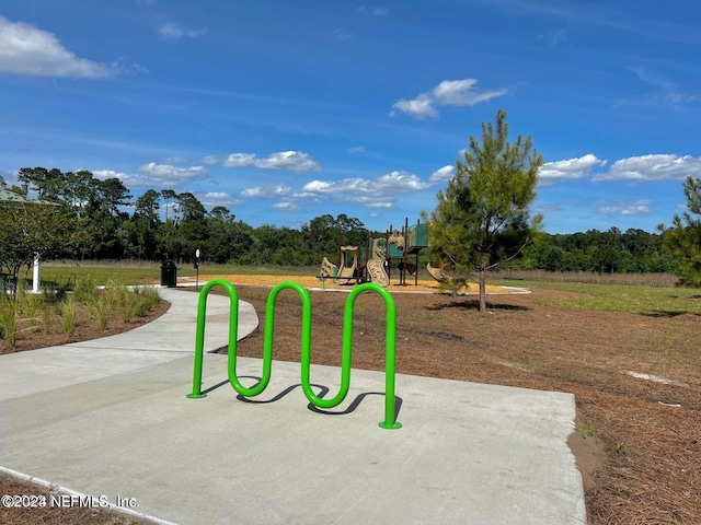 surrounding community featuring a playground