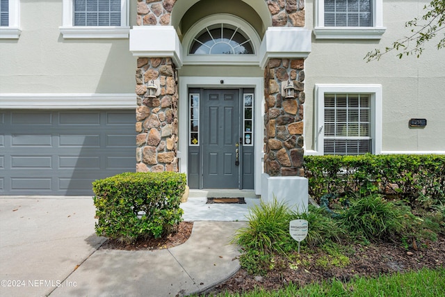 entrance to property with a garage