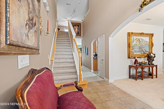 foyer featuring light tile patterned flooring