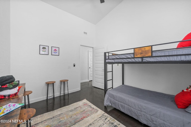 bedroom featuring high vaulted ceiling