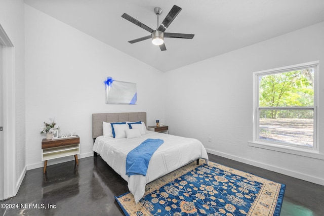 bedroom featuring ceiling fan and lofted ceiling