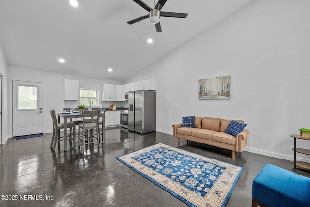 living room with high vaulted ceiling and ceiling fan