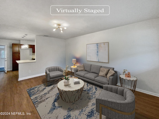 living room with dark wood-type flooring