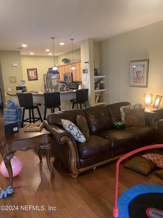 living room with hardwood / wood-style floors