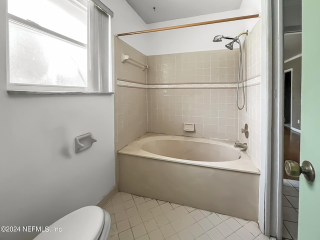 full bath featuring toilet and shower / washtub combination