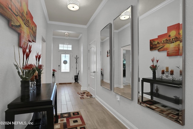 entryway with crown molding and light wood-type flooring