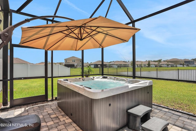 unfurnished sunroom with a hot tub