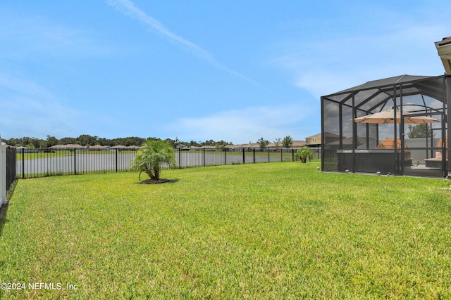 view of yard featuring a lanai