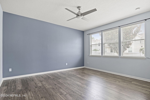 unfurnished room featuring a textured ceiling, hardwood / wood-style floors, and ceiling fan