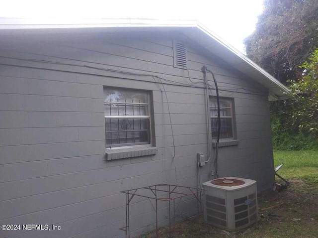 1479 8th St W, Jacksonville, FL 32209 - view of home's exterior featuring central AC