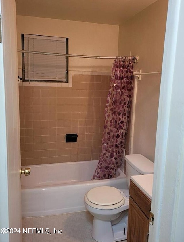 1479 8th St W, Jacksonville, FL 32209 - bathroom featuring vanity, tile patterned flooring, toilet, and shower / tub combo