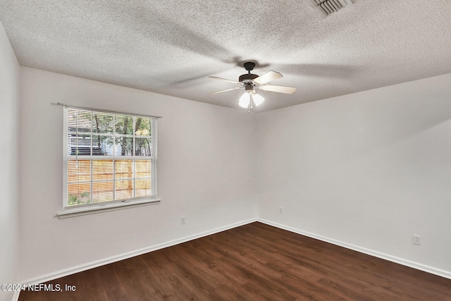 unfurnished room featuring ceiling fan, a textured ceiling, and dark hardwood / wood-style flooring