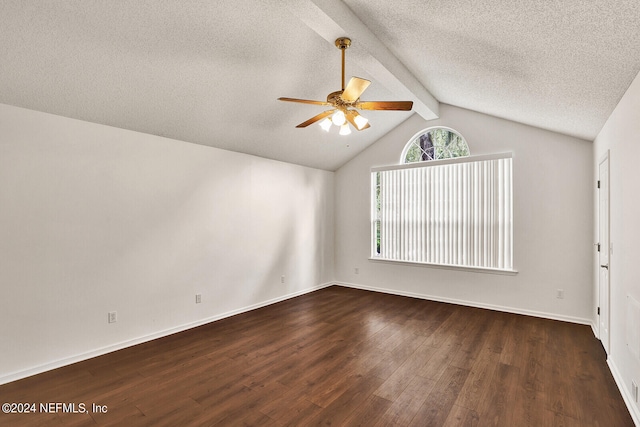 empty room with a textured ceiling, vaulted ceiling with beams, ceiling fan, and dark hardwood / wood-style flooring