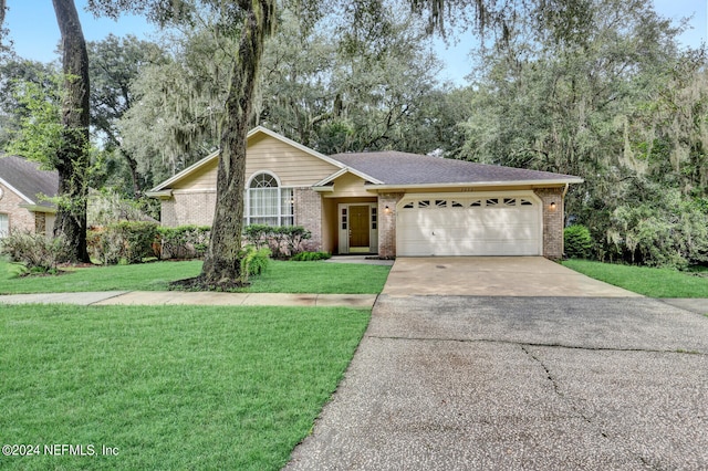 ranch-style house with a front yard and a garage