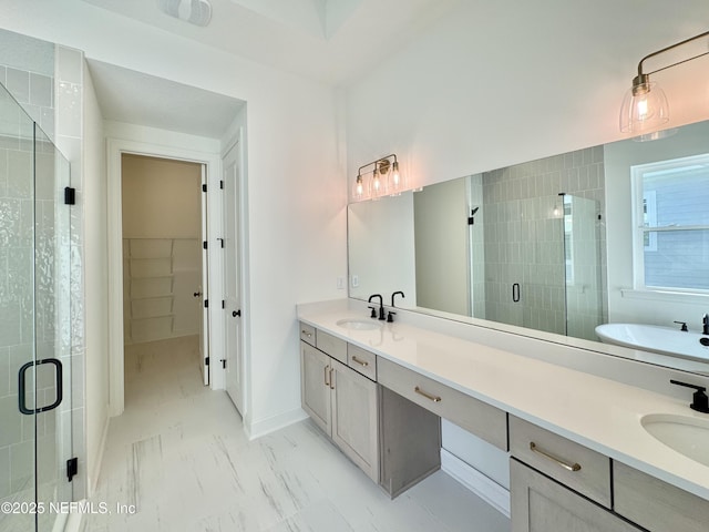 bathroom featuring vanity and walk in shower