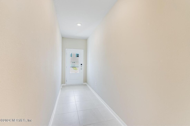 doorway featuring light tile patterned floors