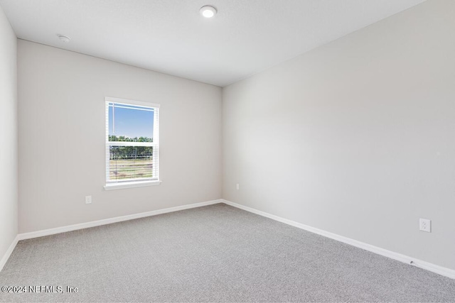 empty room featuring carpet flooring