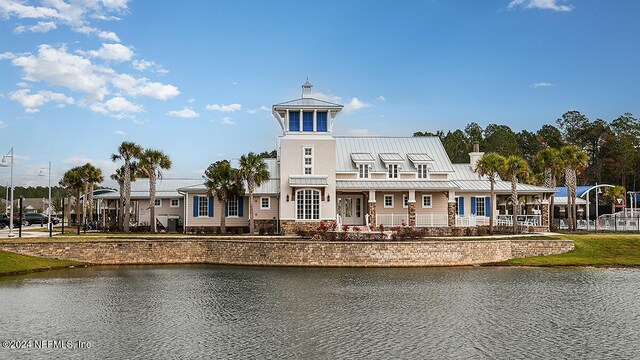 view of building exterior with a water view