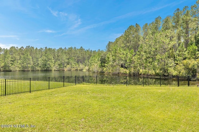 view of yard with a water view