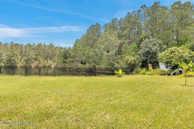 view of yard with a water view