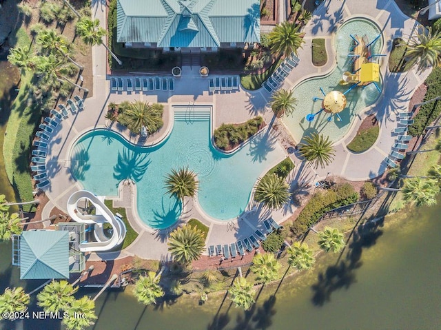 birds eye view of property featuring a water view