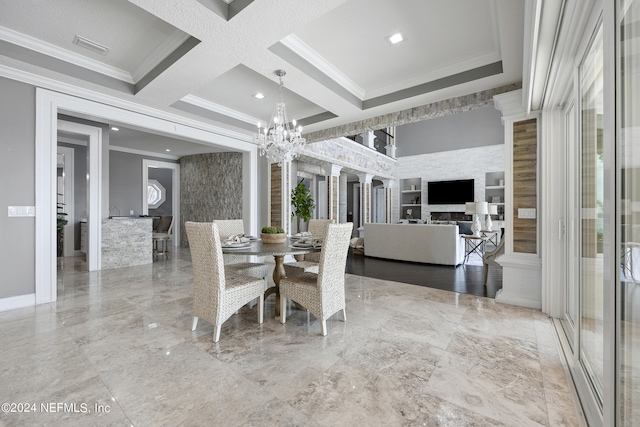 dining space featuring marble finish floor, ornamental molding, coffered ceiling, and a notable chandelier