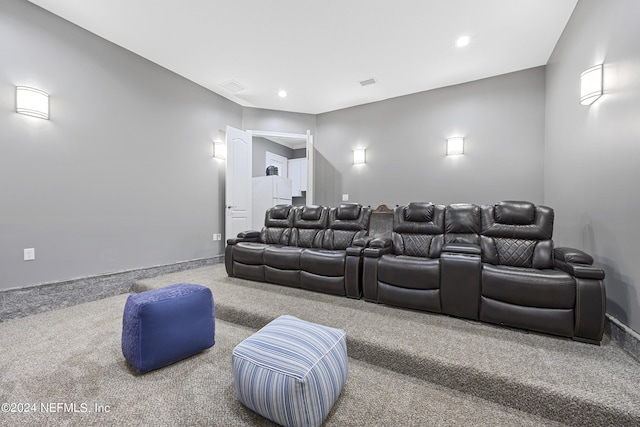 carpeted home theater room featuring visible vents and recessed lighting