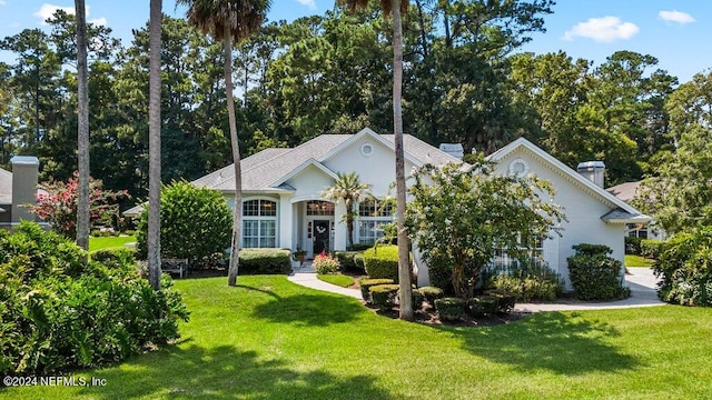 view of front of house with a front lawn