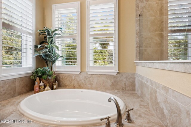 bathroom featuring a bath