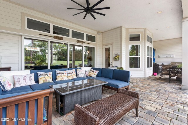 view of patio featuring ceiling fan and an outdoor hangout area