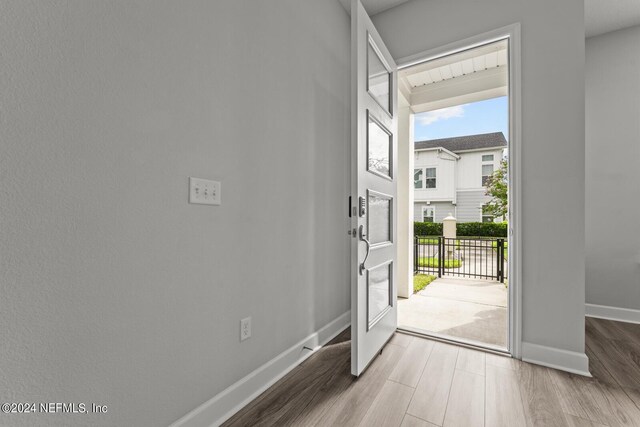 entryway featuring hardwood / wood-style flooring