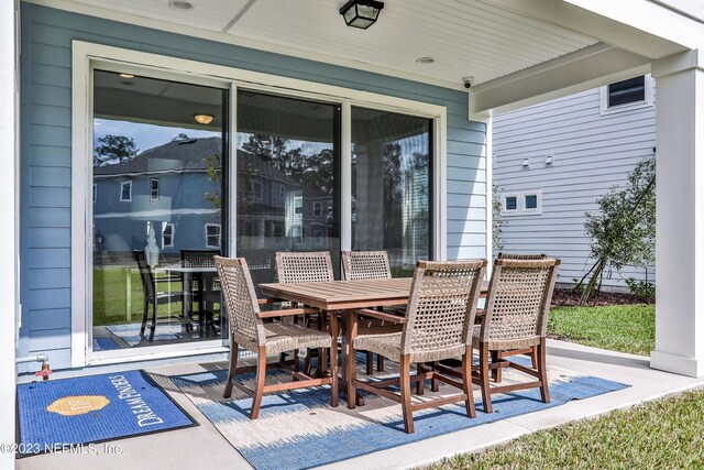 view of patio featuring outdoor dining space